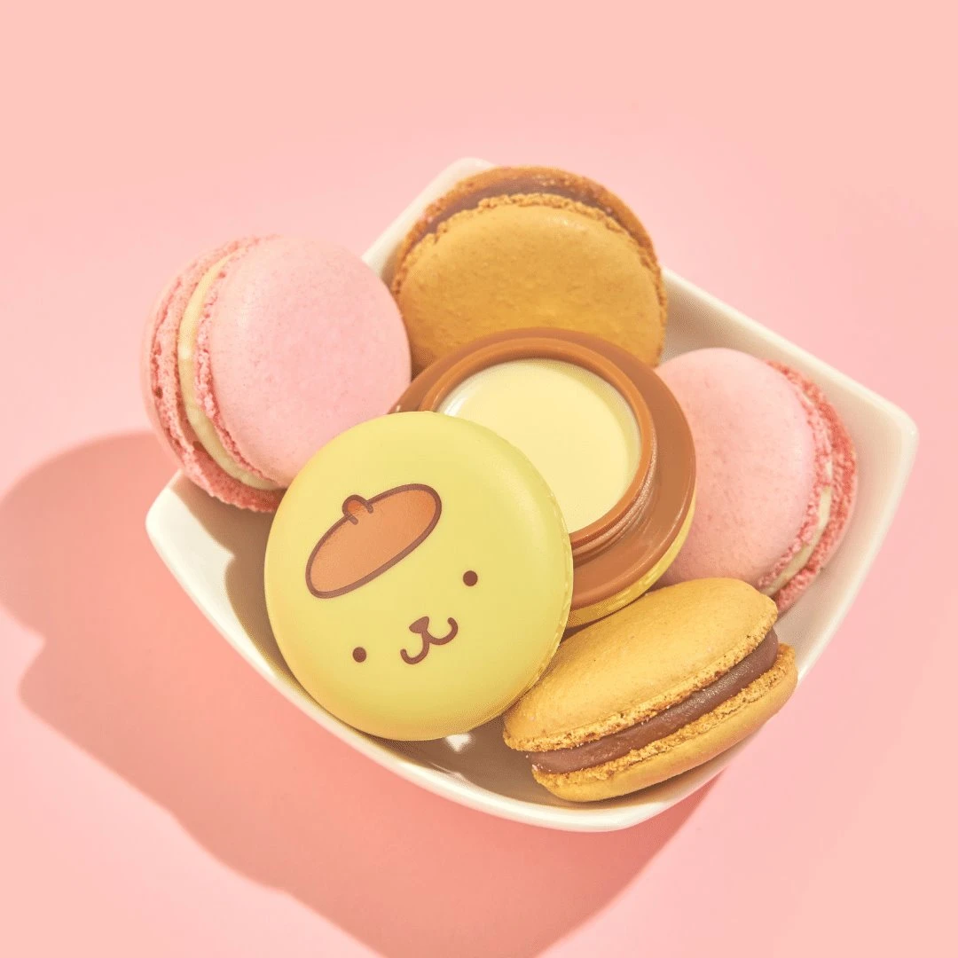The Crème Shop X Sanrio Pompompurin Holiday Macaron Lip Balm - Caramel Pudding Collabs 2 The Crème Shop X Sanrio Pompompurin Holiday Macaron Lip Balm - Caramel Pudding Collabs